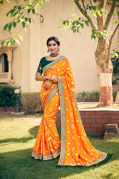 Graceful Bright Yellow Chiffon Saree with Bandhani Print, Work Border and Designer Blouse