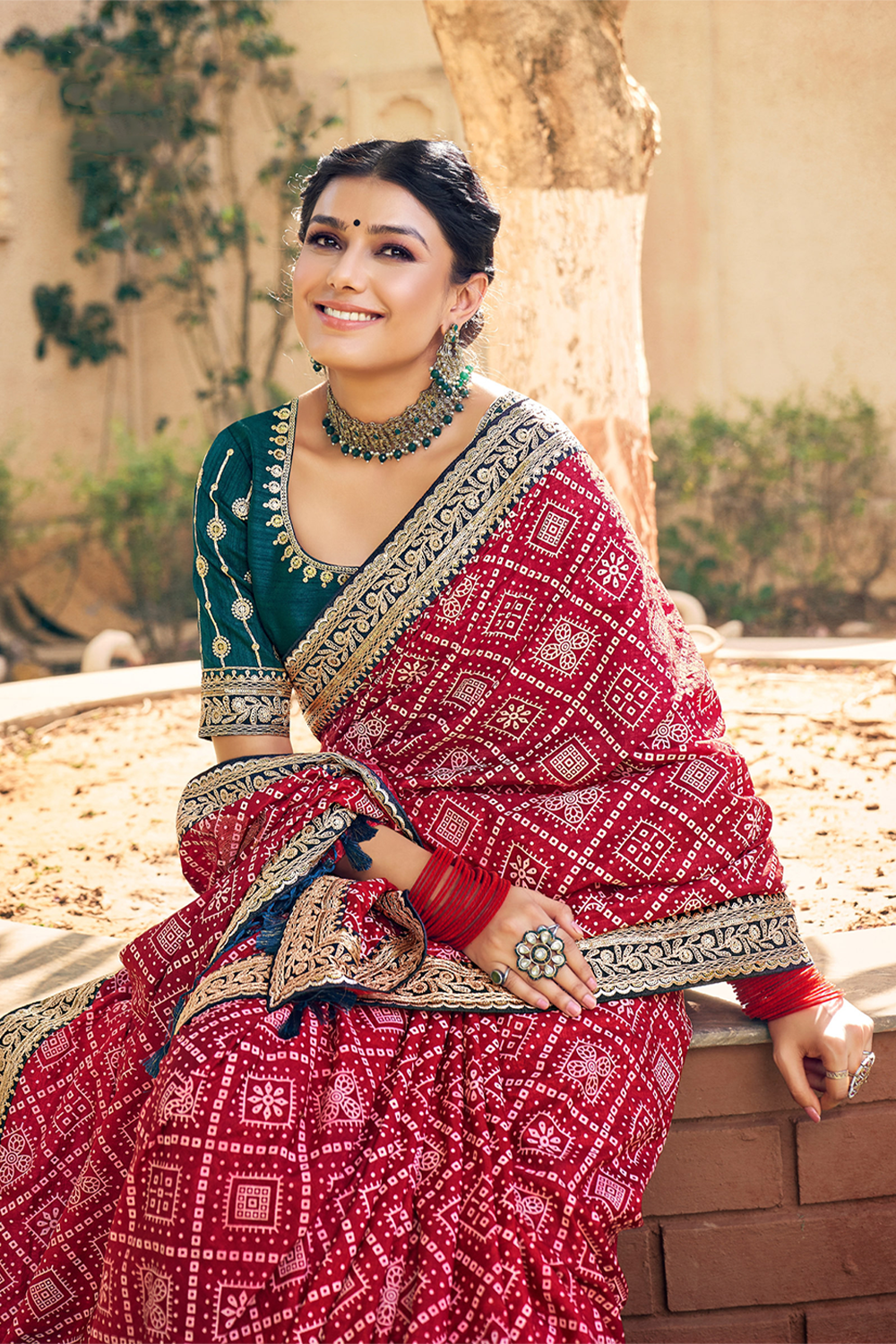 Graceful Maroon Chiffon Saree with Bandhani Print, Work Border and Latest Designer Blouse