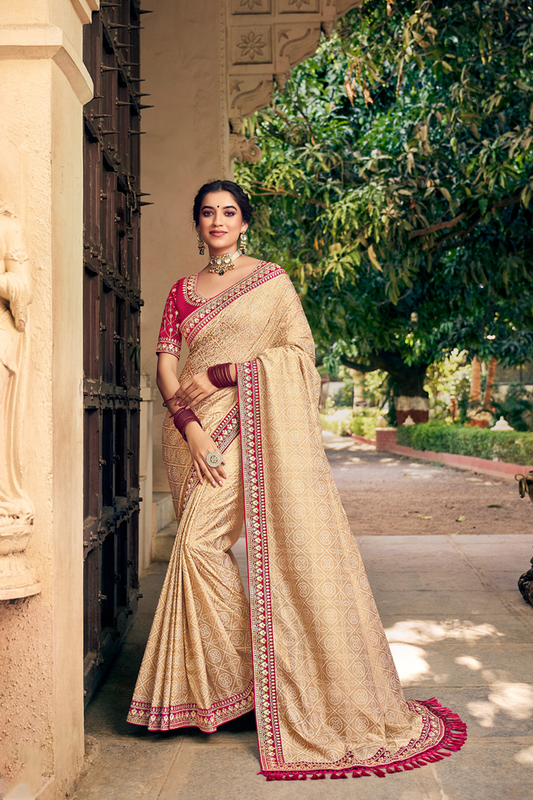 Exquisite Beige Chiffon Saree with Bandhani Print, work Border and Designer Blouse