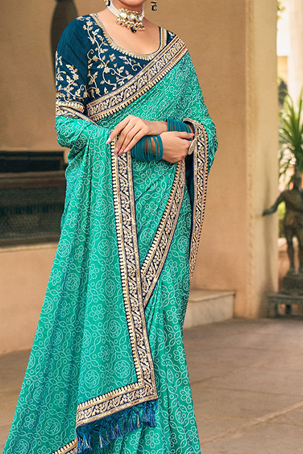 Radiant Turquoise Chiffon Saree with Bandhani Print, Work Border and Latest Designer Blouse