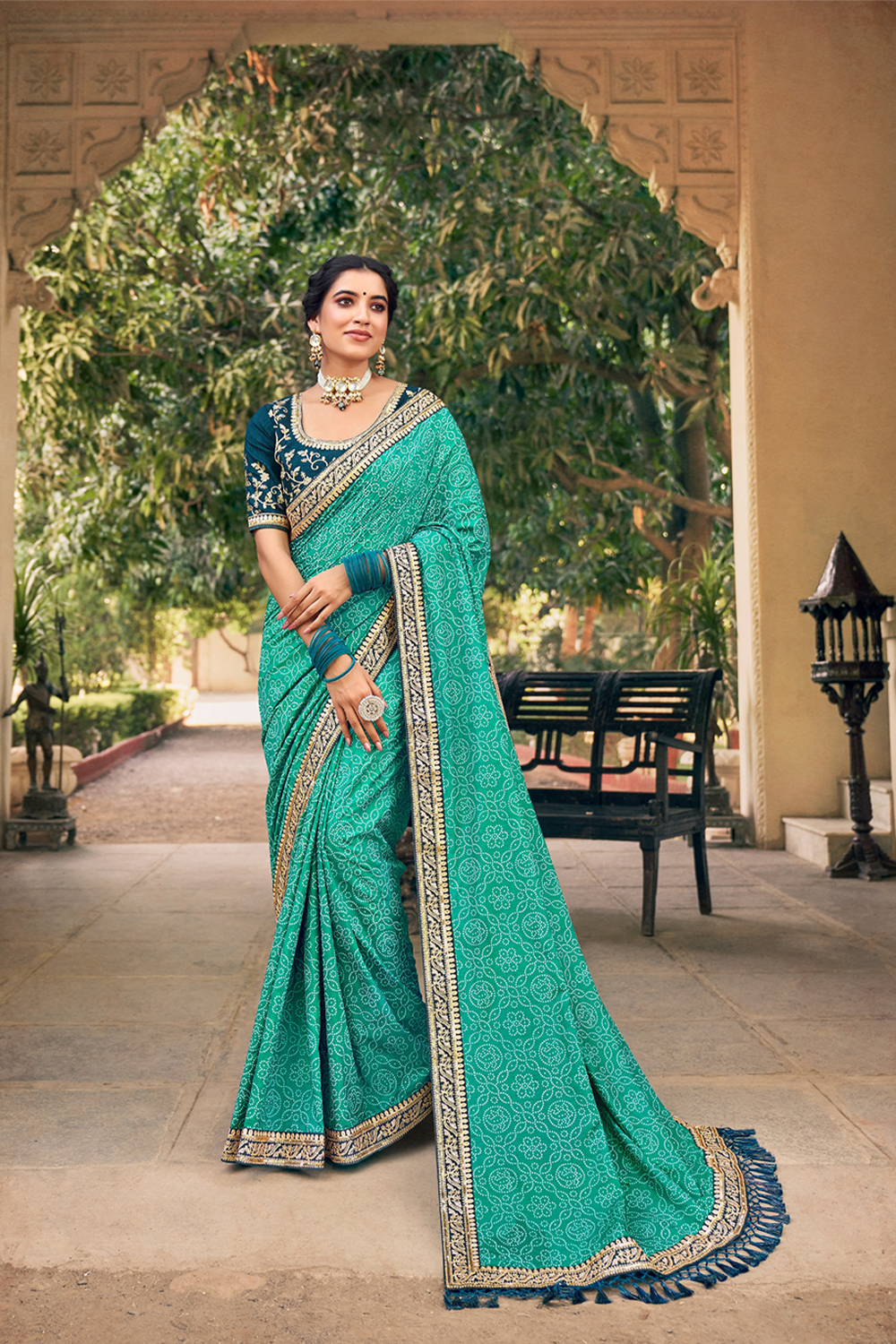 Radiant Turquoise Chiffon Saree with Bandhani Print, Work Border and Latest Designer Blouse