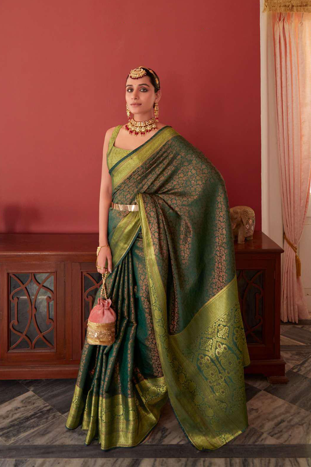 Ambikam Green Kanjivaram Silk Saree Woven with Golden Zari work and latest designer Blouse