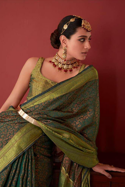 Ambikam Green Kanjivaram Silk Saree Woven with Golden Zari work and latest designer Blouse