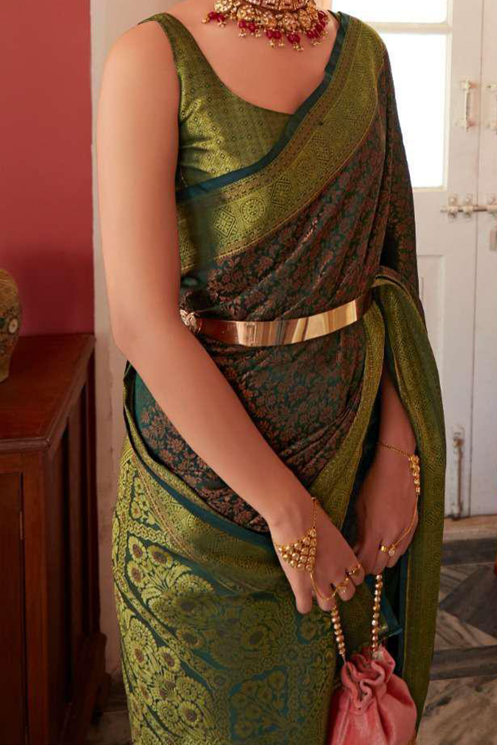 Ambikam Green Kanjivaram Silk Saree Woven with Golden Zari work and latest designer Blouse