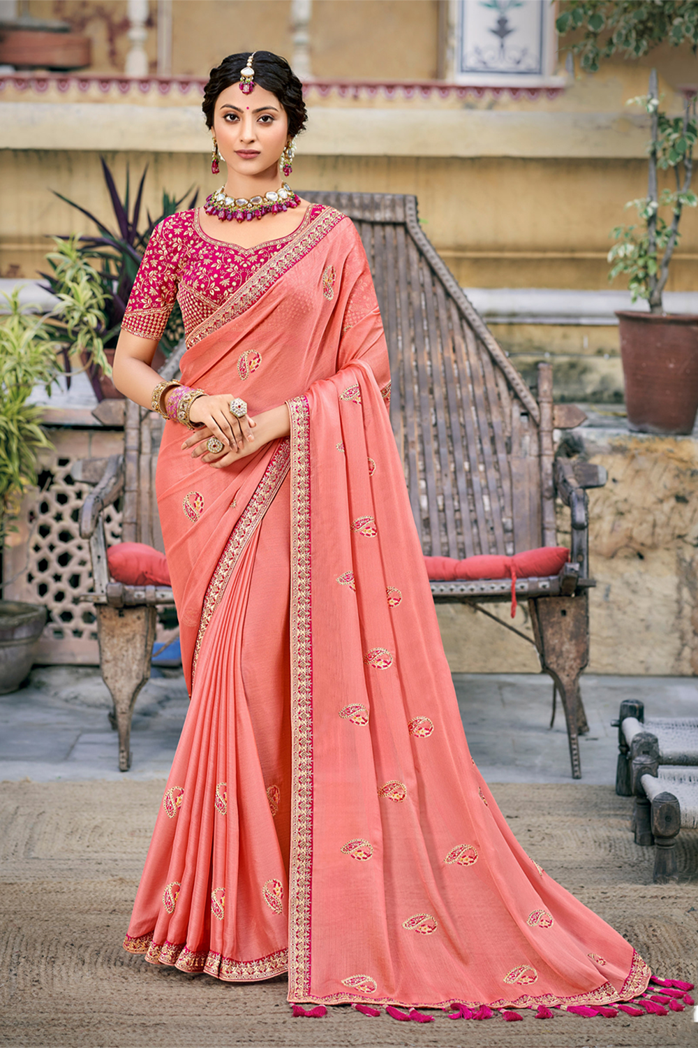 Graceful Light Coral Chiffon Saree with Work border and latest designer blouse Blouse