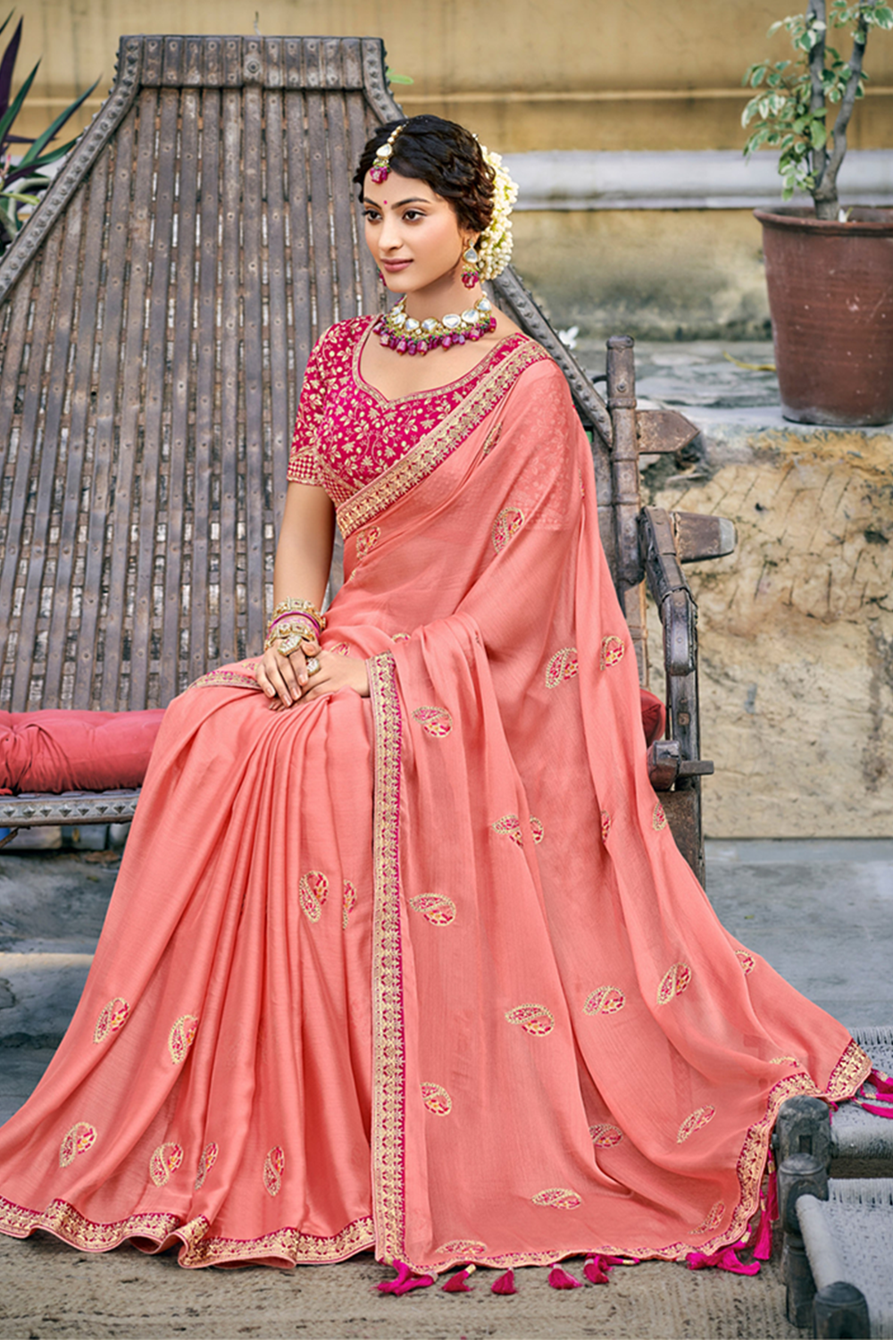 Graceful Light Coral Chiffon Saree with Work border and latest designer blouse Blouse