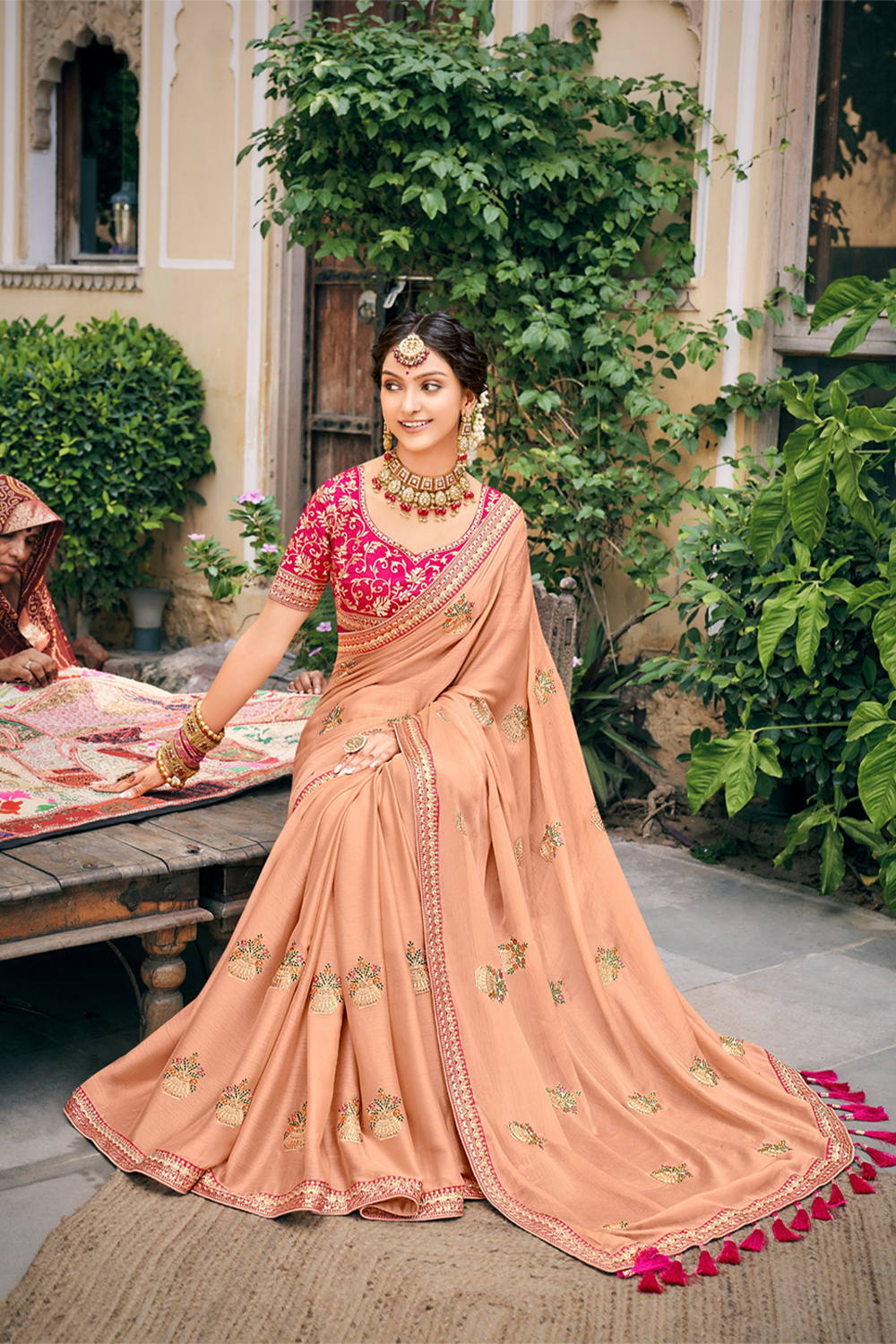 Gracious Peach Chiffon Saree with Work border and Latest Designer Blouse