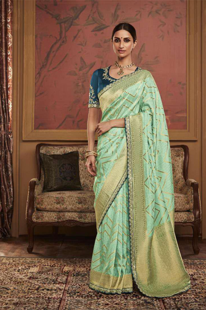 Ambikam Sea Green Dola Silk Saree with Latest Designer Blouse